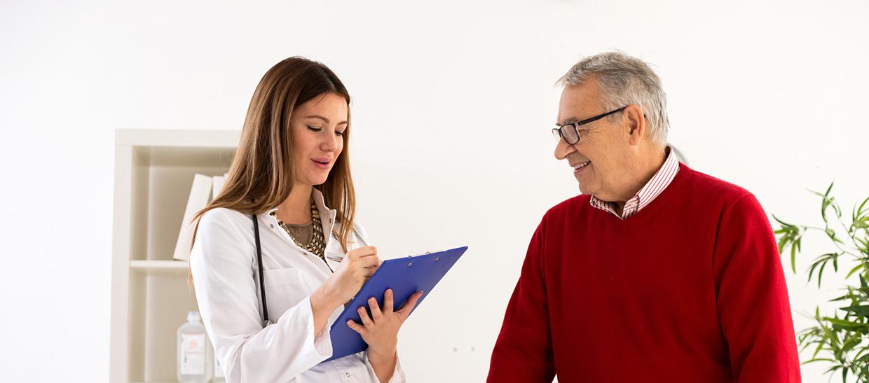 Health professional assisting patient