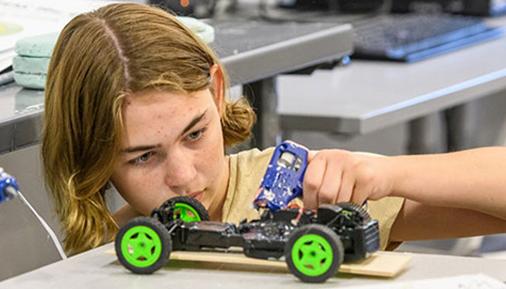 Students builds a car during camp